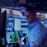 Shares steady, dollar slips as markets pare Fed rate risks