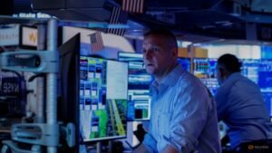 Shares steady, dollar slips as markets pare Fed rate risks