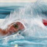 Marchand still the home hero in Paris as new record breakers emerge
