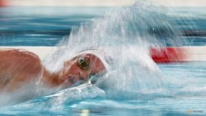 Marchand still the home hero in Paris as new record breakers emerge
