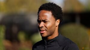 Former England forward Sterling charged with dangerous driving