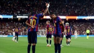 Raphinha and Lamine doubles lift Barcelona past Rayo Vallecano
