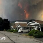 ‘Total incinerated destruction’: Canada wildfire evacuees wonder if they still have homes