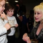 How Dolly Parton helped the world – from children’s books to supporting Covid vaccine