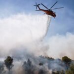 Greece: fire brigade helicopters collide as wildfires spread
