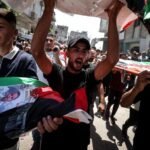 Mass funeral in Gaza as attacks continue despite truce push