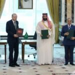Which country is the new Mecca defense pact targeting?