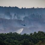 Germany news: Friedrich Merz visits area struck by fires