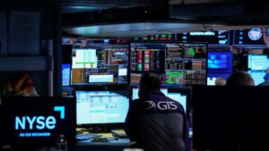 Dow edges to record as markets parse prospects for Hormuz deal