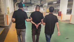 Two mobile phone shop employees arrested over scheme to compromise Singpass accounts