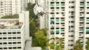 Man arrested after marble fired from catapult allegedly damages Woodlands flat window