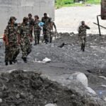 Rescuers continue grim search for Nepal flood survivor