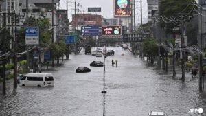 Canals full, roads submerged as Bangkok declares flood disaster