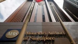 MAS warns of fresh global shocks and AI pullback, but says Singapore firms and households well-buffered