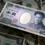 Dollar gains on rate hike expectations, yen retreats past 160