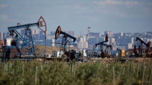 Oil prices fall after hitting over one-month high; traders weigh supply risks