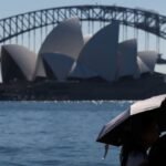 Sydney sweats in spring hot spell, faces ‘extreme’ bushfire risk