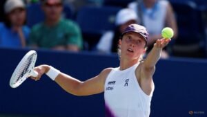 Swiatek happy to swap noisy Ashe spotlight for intimate Grandstand