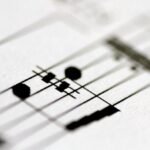 Suno releases new AI music models in partnership with Warner Music, BMG
