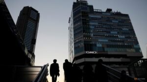 Japan to sidestep funding in tax cut outline, keep fiscal concerns alive