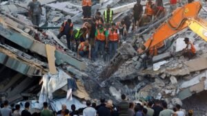 War-damaged Gaza building collapses killing 12 people seeking shelter inside