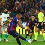 Flick sets record as Barcelona breeze past Racing with Raphinha hat-trick