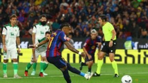 Flick sets record as Barcelona breeze past Racing with Raphinha hat-trick