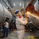 China factory activity returns to growth in September