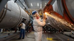 China factory activity returns to growth in September