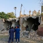 Bombing at mosque near police offices in Pakistan kills at least 21