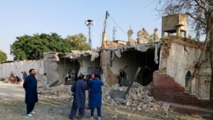 Bombing at mosque near police offices in Pakistan kills at least 21