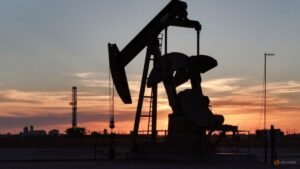 Oil holds near two-week lows on easing supply concerns