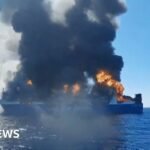 Smoke rises from burning Greek cargo ship near Mykonos