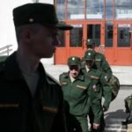 Putin rejects mobilization rumors, many Russians unconvinced