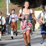 Oktoberfest opens as crowds race for best beer tent spots