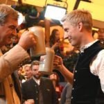 Oktoberfest opens as Munich mayor taps first beer keg