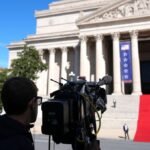 TV networks resume covering White House as press access fight continues