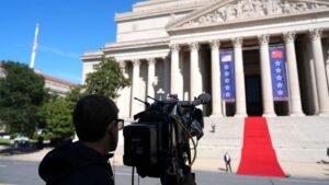 The White House network TV pool resumes operations after a dayslong ban of news outlets from grounds