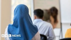 Austria’s Islamic headscarf ban in force as under-14s go back to school