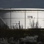 US jobs data boosts stocks as oil prices dip