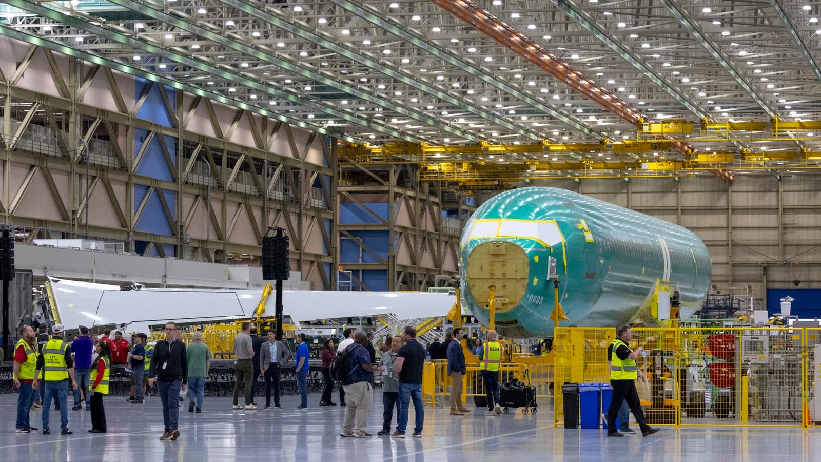 Boeing narrows third-quarter loss as defense sales rise, but focus remains on 737 Max production