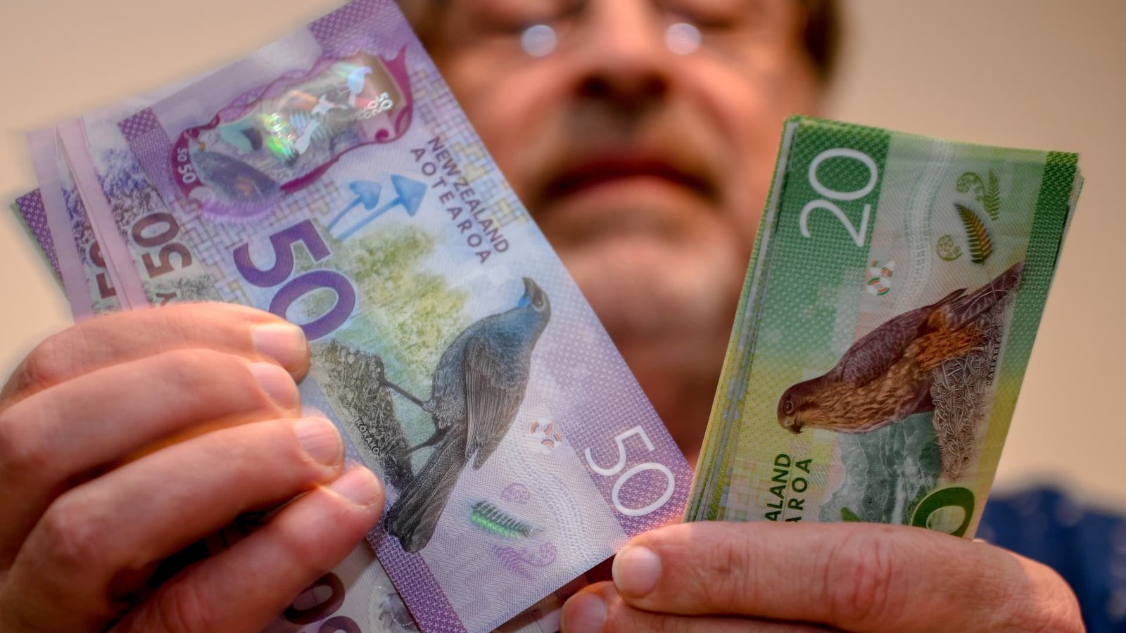 New Zealand dollar tanks after central bank defies markets’ near-certainty it would hike rates