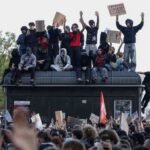 France pledges more teachers after school students vow no let-up
