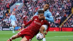 Man City silence hostile Anfield with 3-0 win over Liverpool