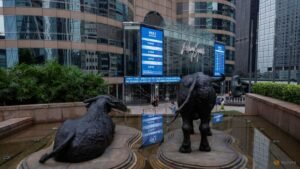 Asian stocks slip, Wall St and bonds benefit from oil skid