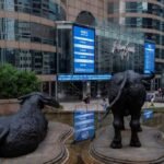Asian stocks slip, Wall St and bonds benefit from oil dip