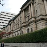 Bank of Japan may raise inflation forecast, stand pat on rates, sources say