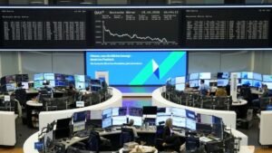 Shares down again as oil stays high; AI earnings in focus
