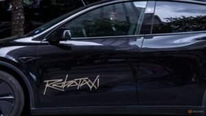 Tesla aims to sell Cybercab robotaxis by end of year despite federal probe