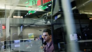 Wall Street futures dip after AI rout, telecoms slide